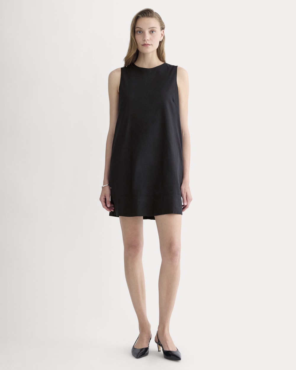 The Shift Dress in Stretch Linen in Black — front view