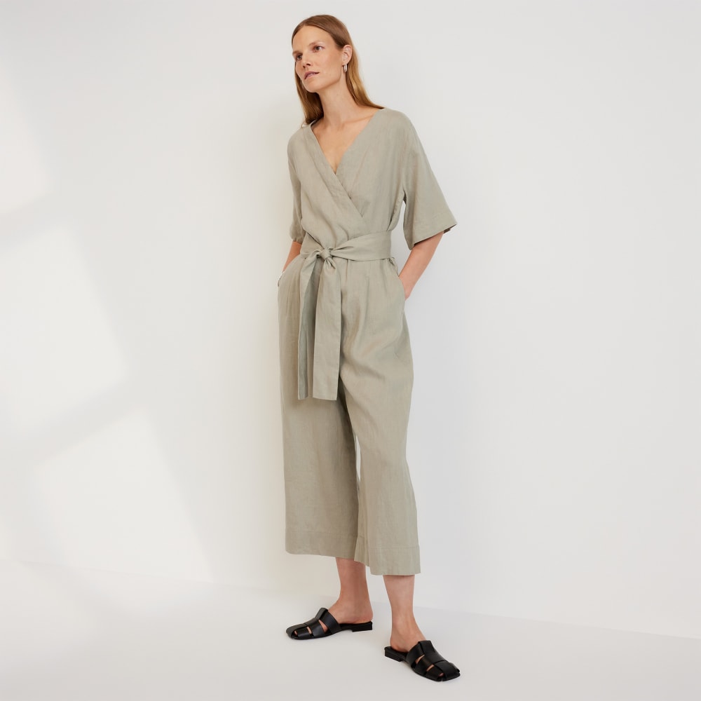 The Wrap Jumpsuit in Linen in Seagrass — front view