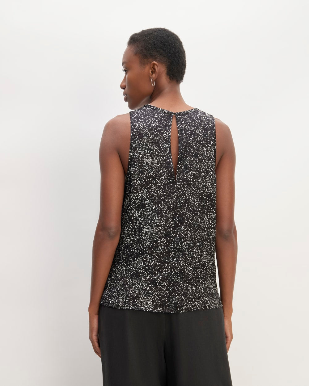The Satin Racerback Top in Black Moonsplatter — detail view