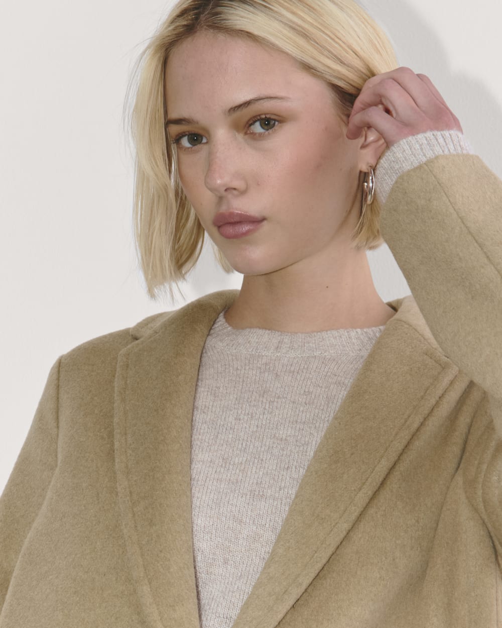 The Topcoat in Wool in Dark Heathered Camel — detail view