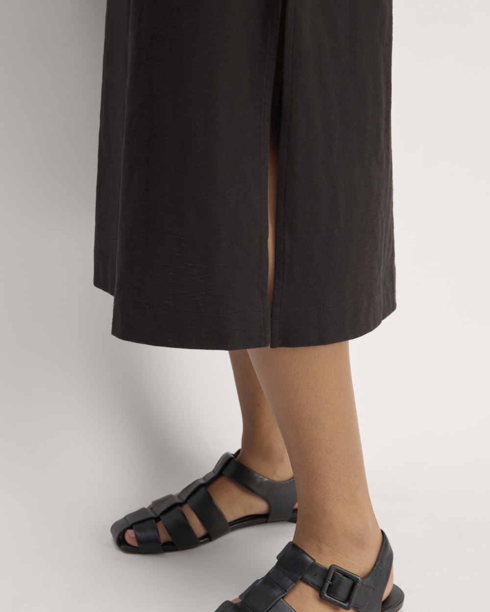The Muscle Tee Midi Dress in Black — detail view