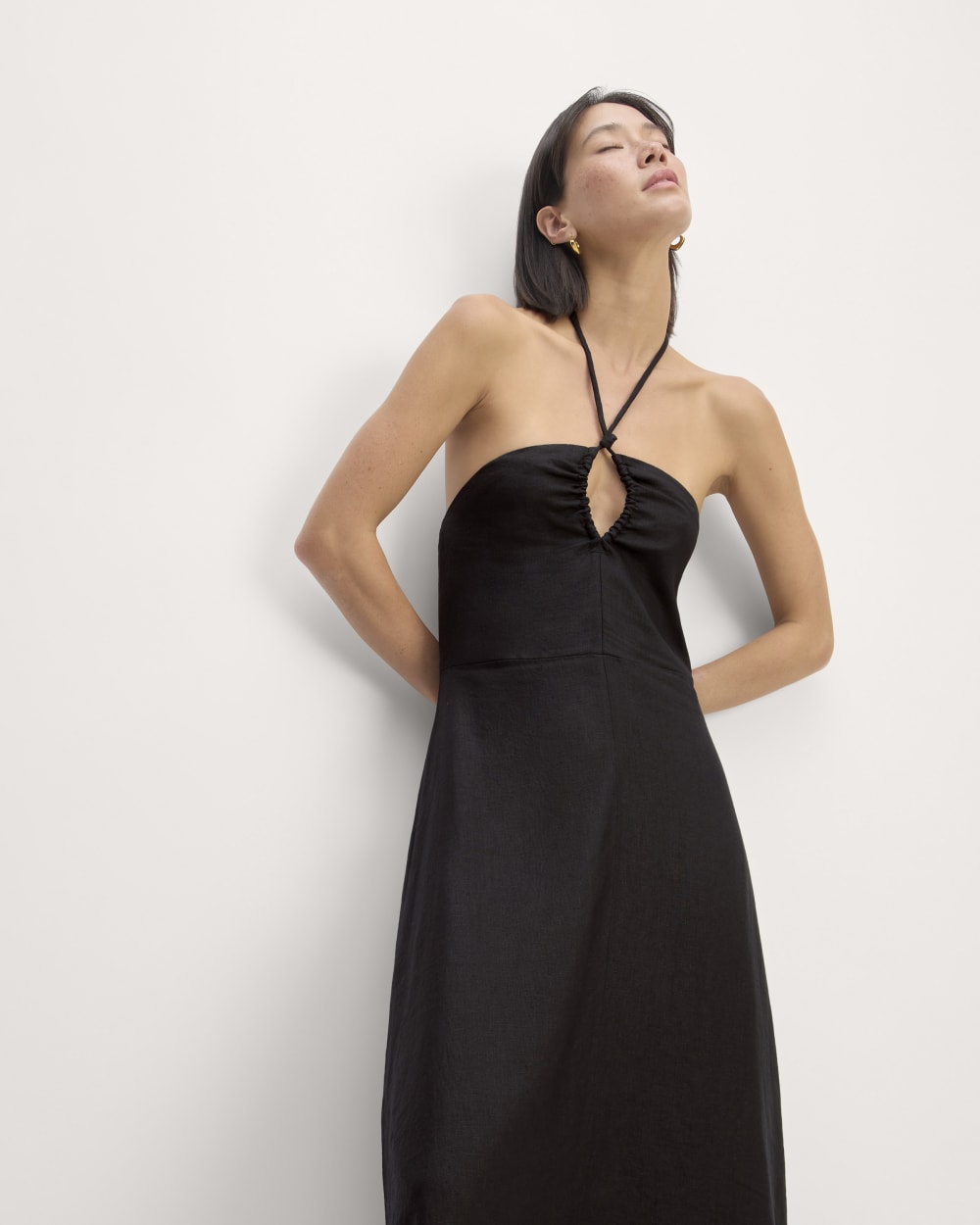 The Linen Halter-Neck Dress in Black — detail view