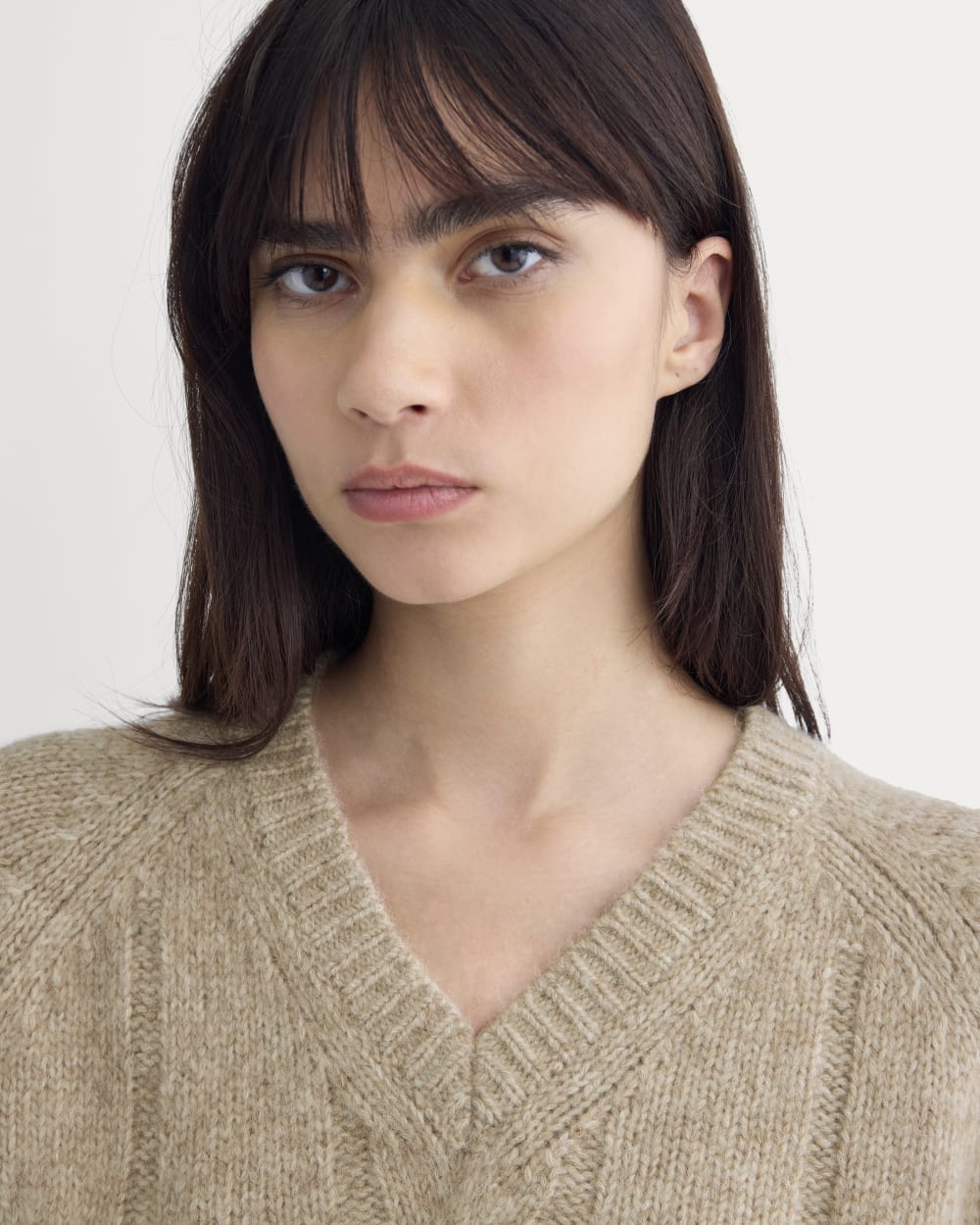 Cloud Cable V-Neck Sweater in Heathered Oatmeal — detail view