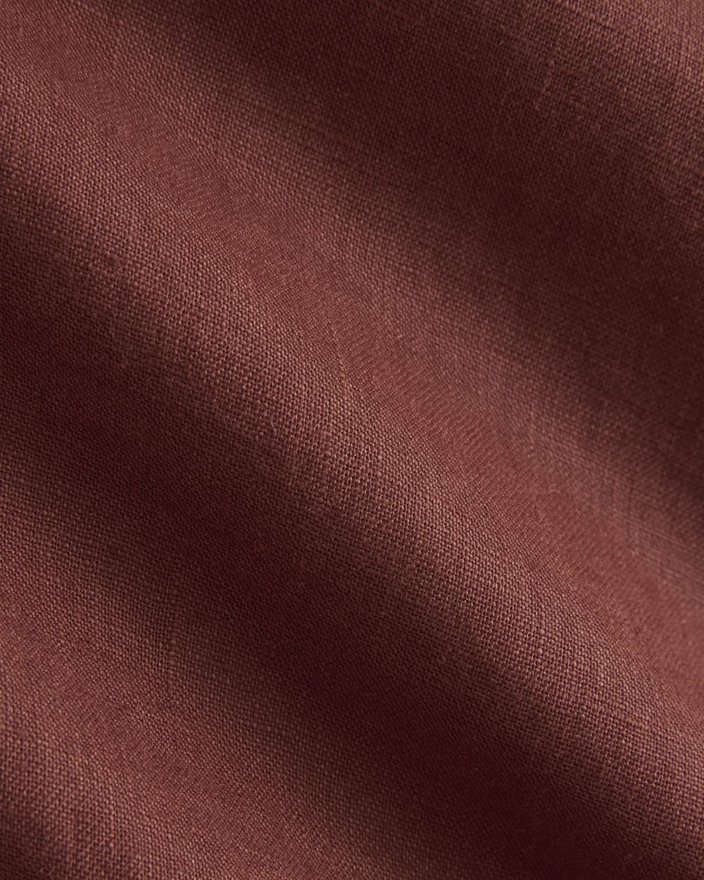 The Linen High-Neck Tank in Henna Red — detail view