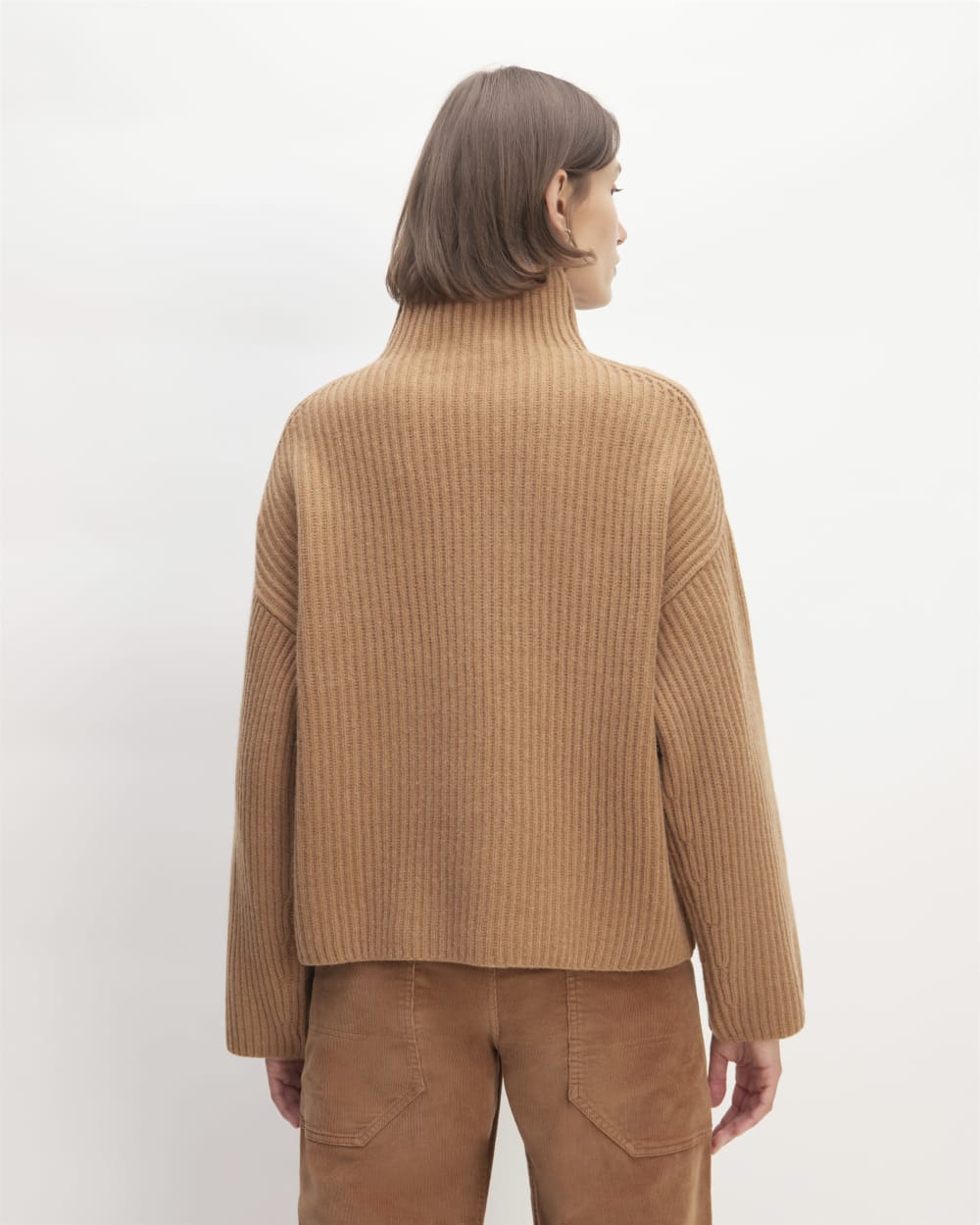 The Felted Merino Funnel-Neck Pullover in Deep Camel — detail view