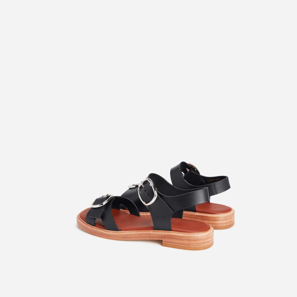 The Twin Buckle Sandal in Black — detail view