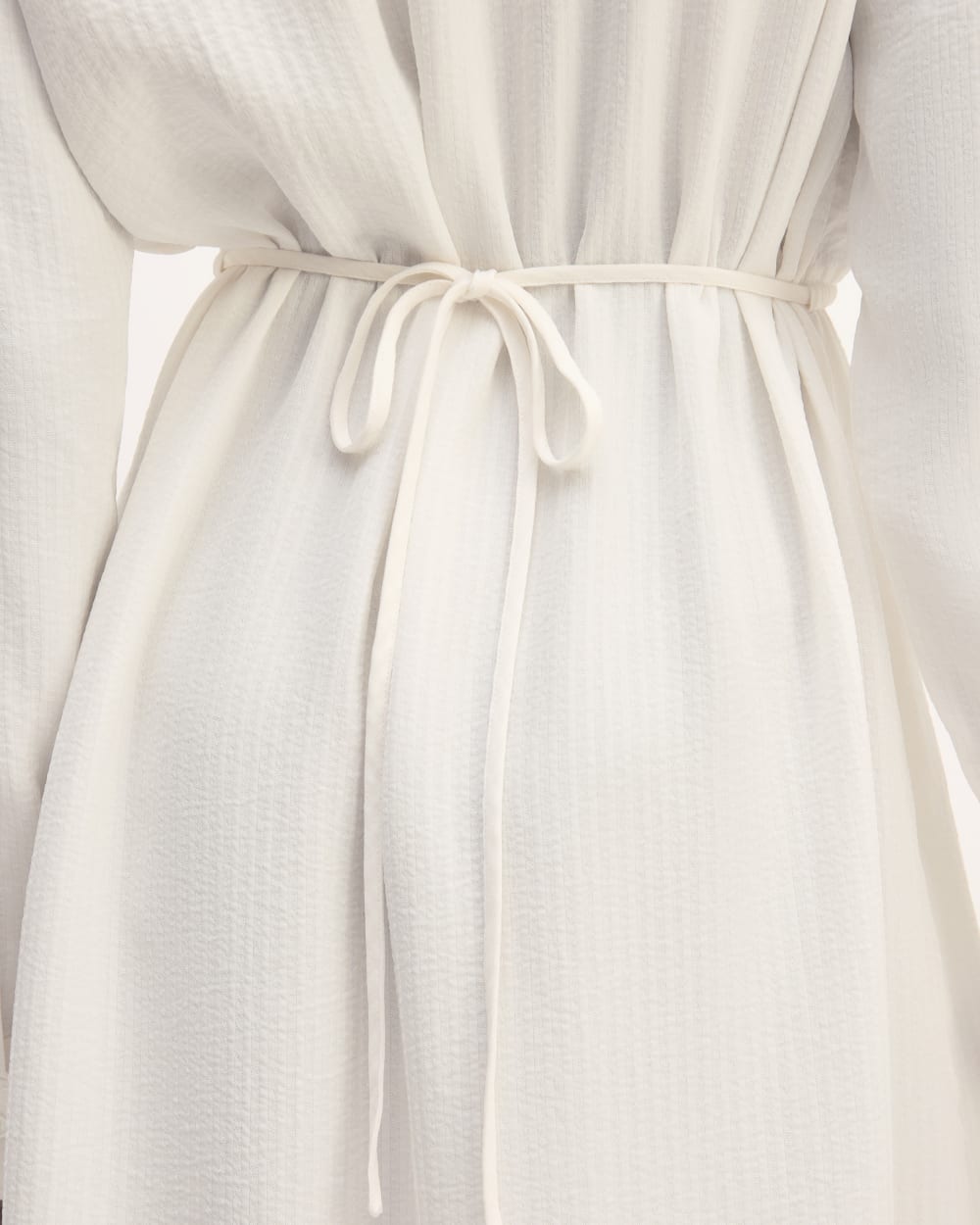 The Mini Jacquard Stripe Shirt Dress in Bone — detail view