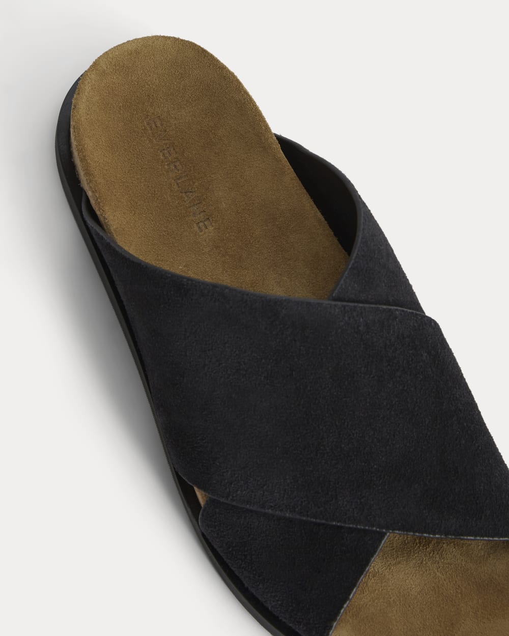 The Suede Crossover Sandal in Black — detail view