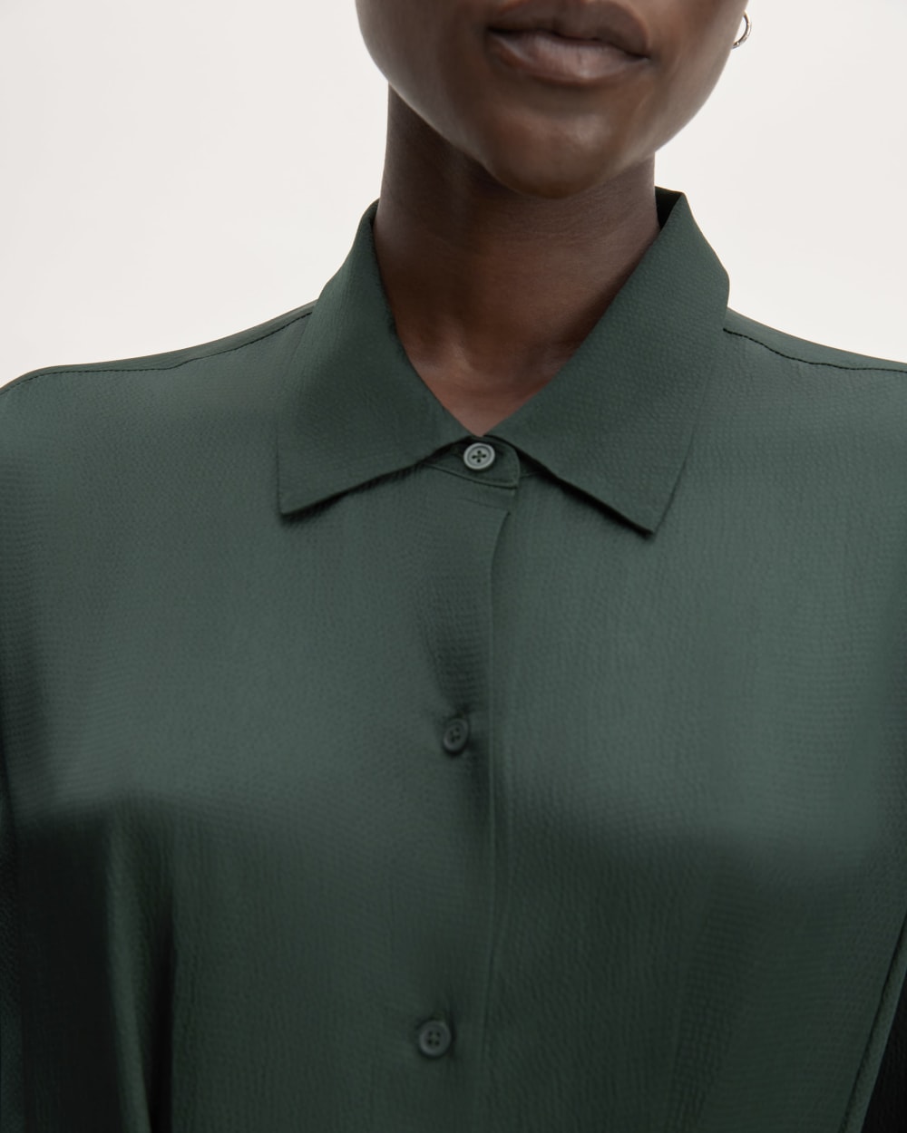 The Hammered Satin Shirt Dress in Scarab — detail view