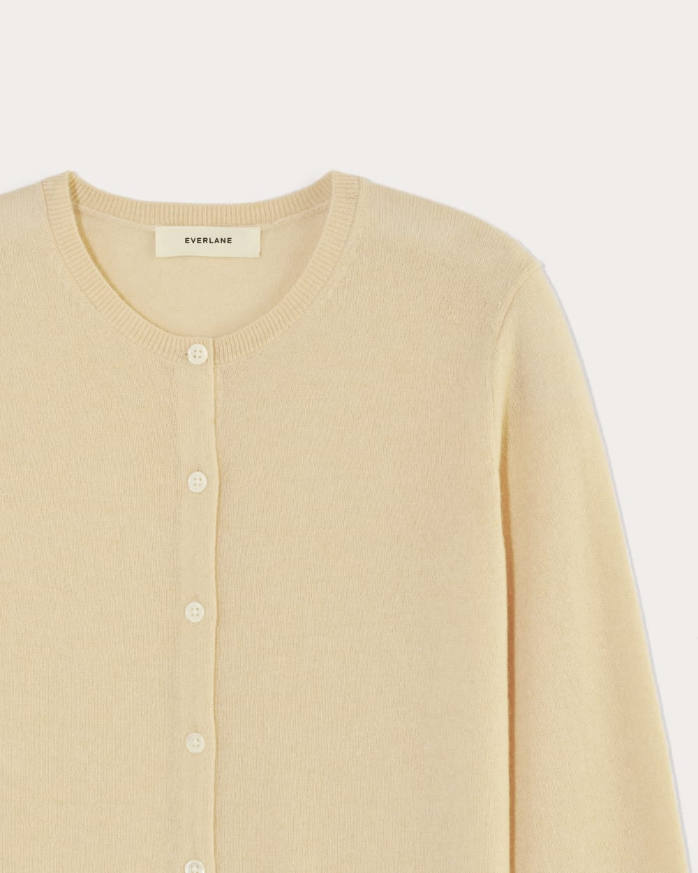 The Classic Cardigan in Cashmere in Creme — detail view