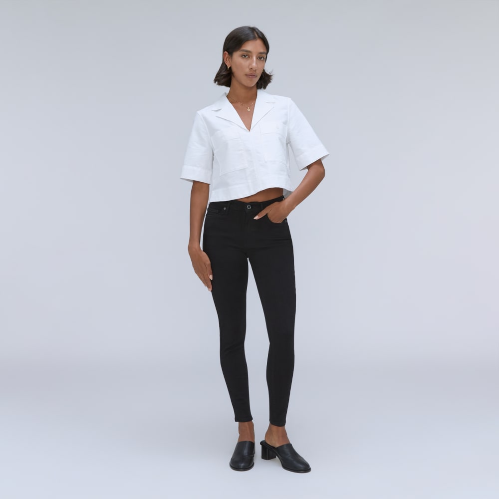 The Mid-Rise Skinny Stretch Jean in Black — detail view