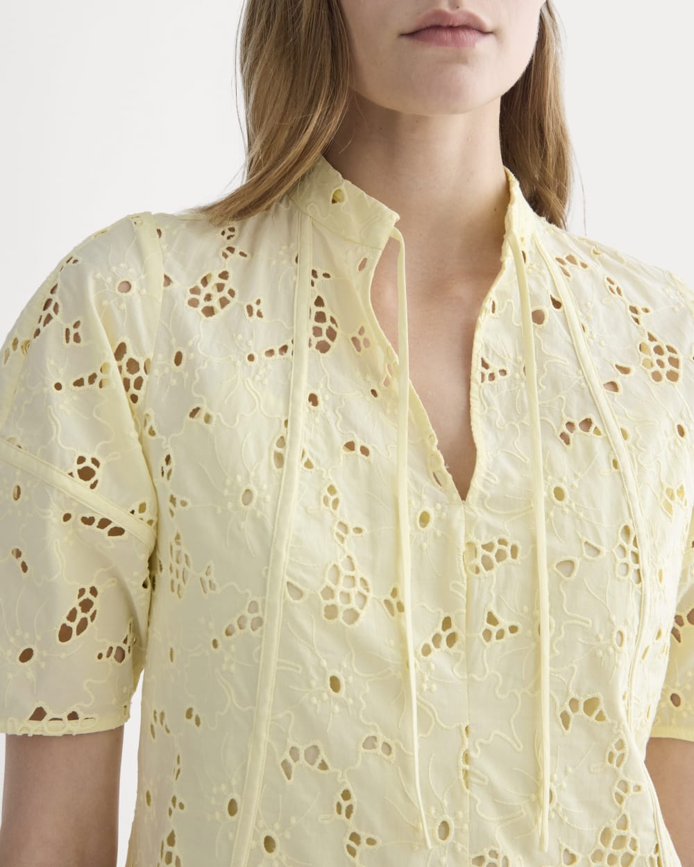 The Eyelet Midi Dress in Light Yellow — detail view
