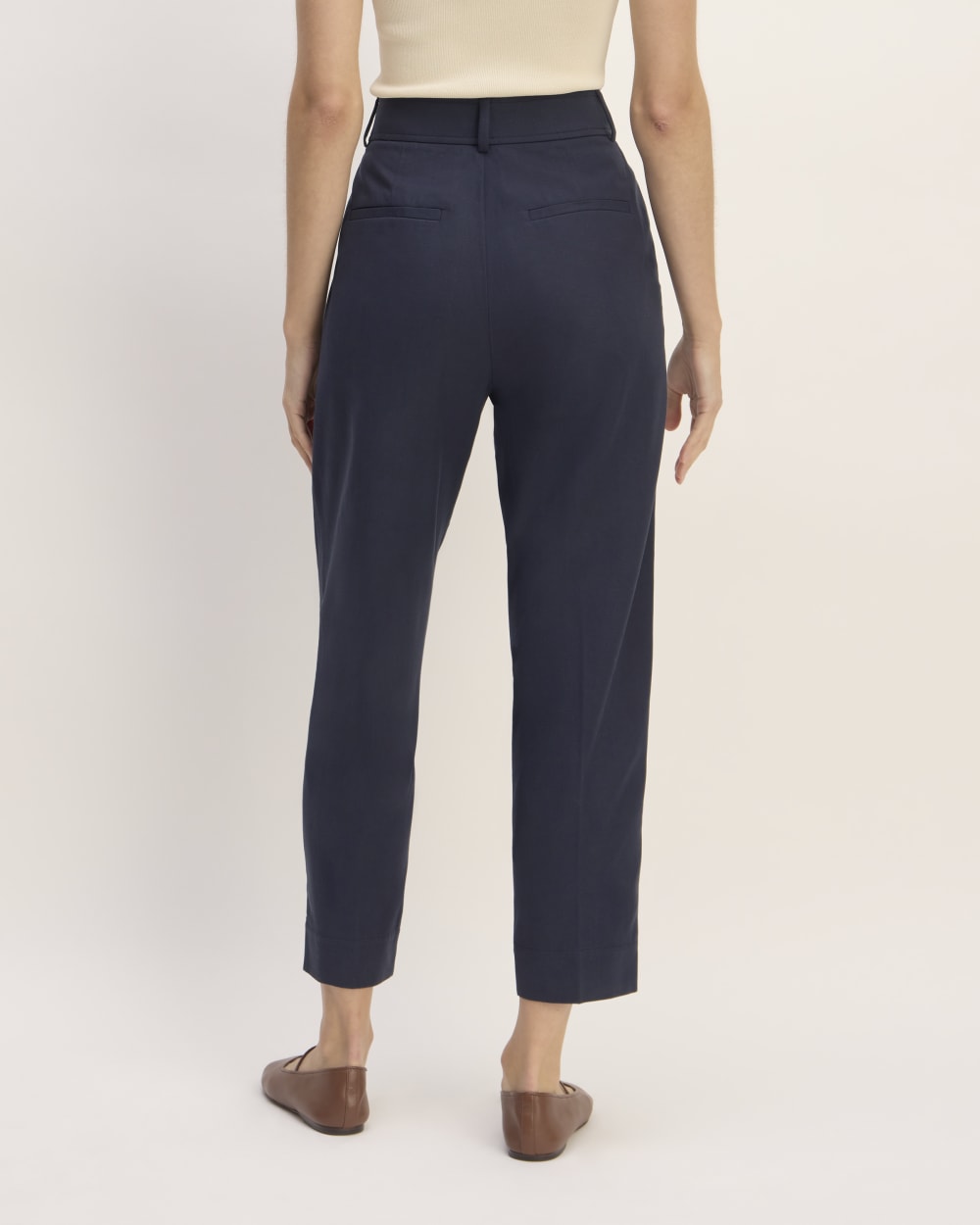 The Draper Tapered Pant in Buttersmooth in Navy — detail view