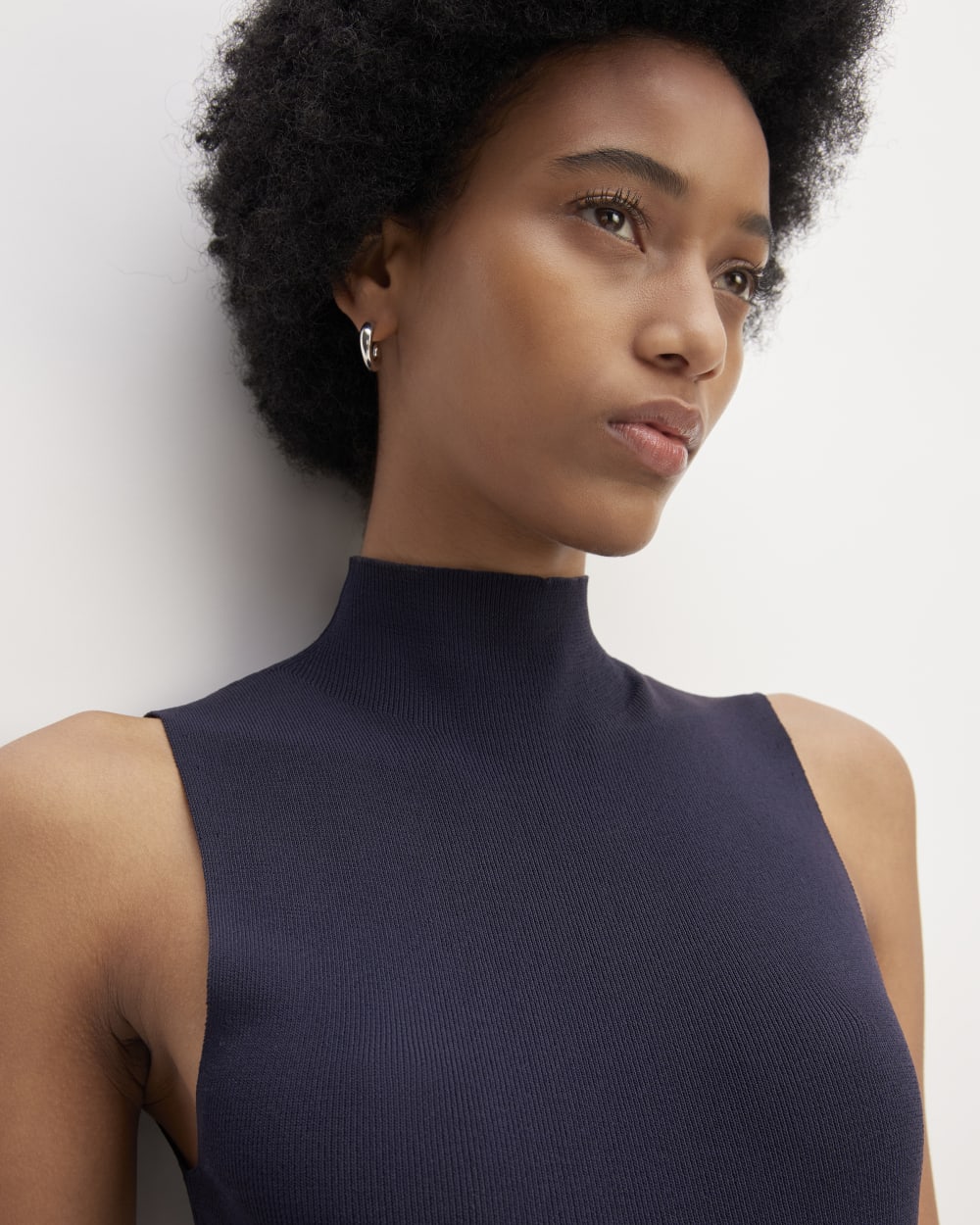 The Viscose Mock Neck Top in Navy — detail view