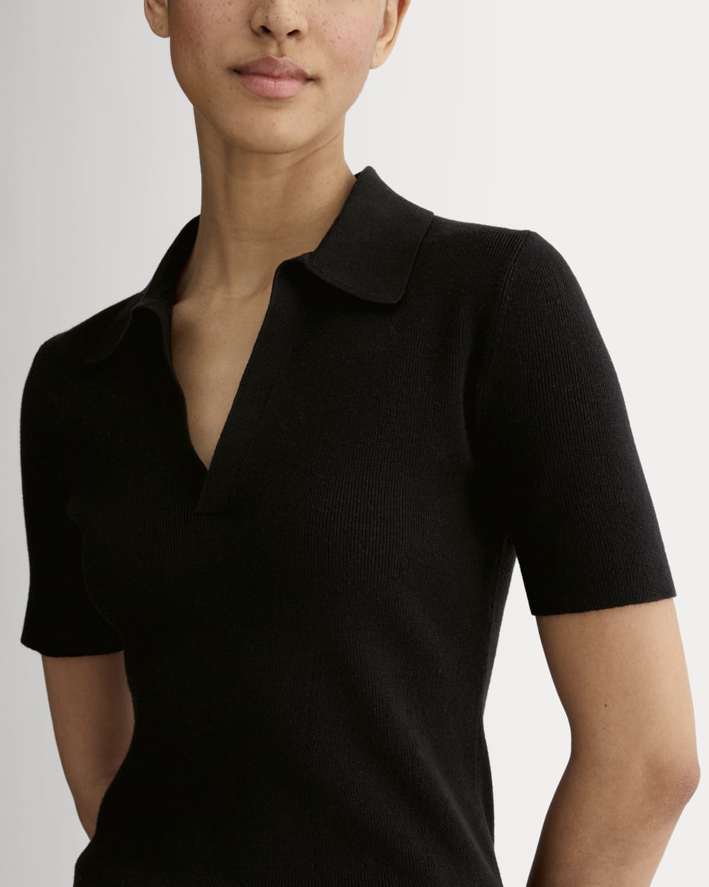 The Knit Polo in Black — detail view