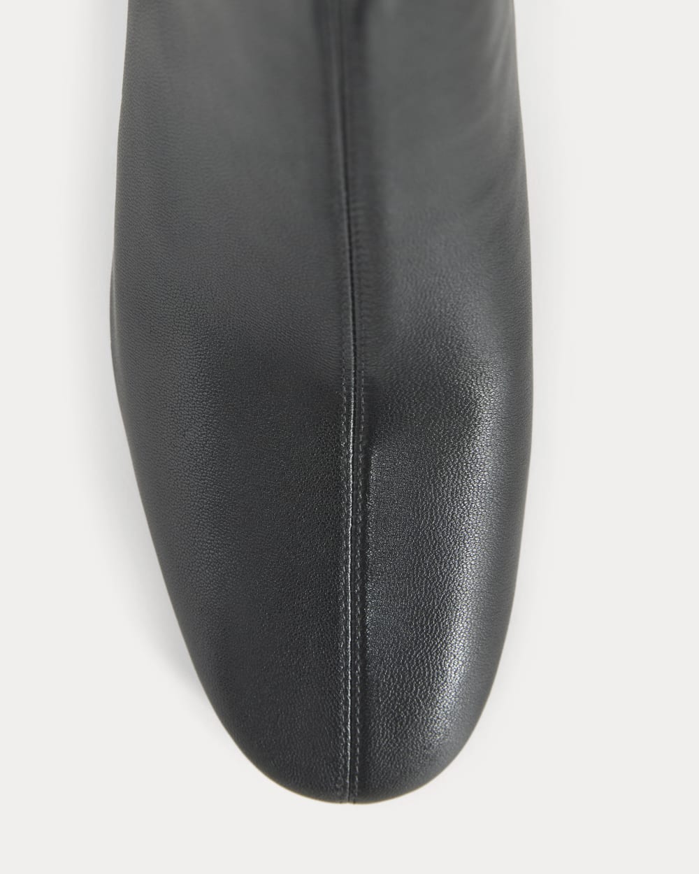 Leather Curved-Heel Boot in Black — detail view