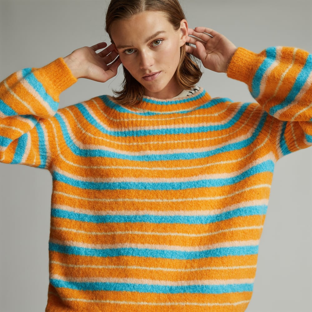 The SuperFuzz Alpaca Oversized Crew in Turmeric Stripe — front view