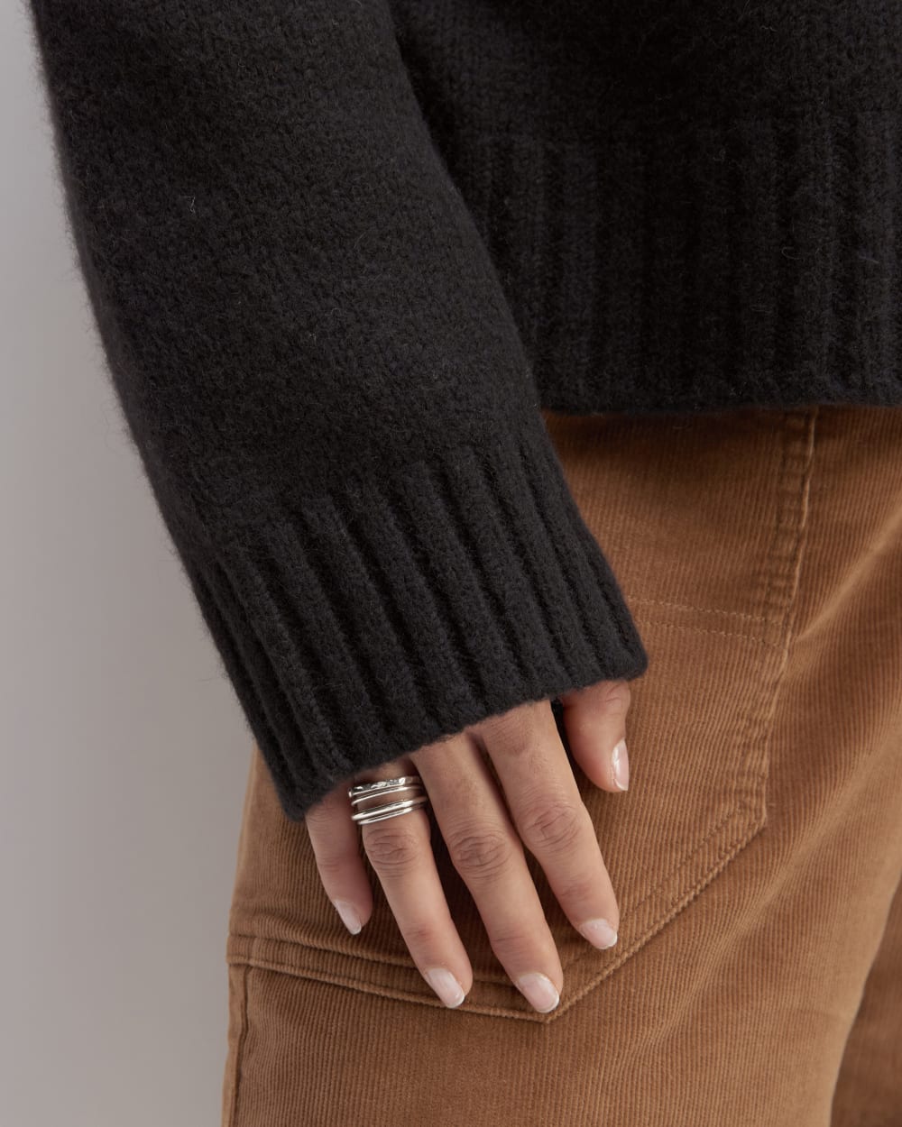 The Cloud Oversized Turtleneck in Black — detail view