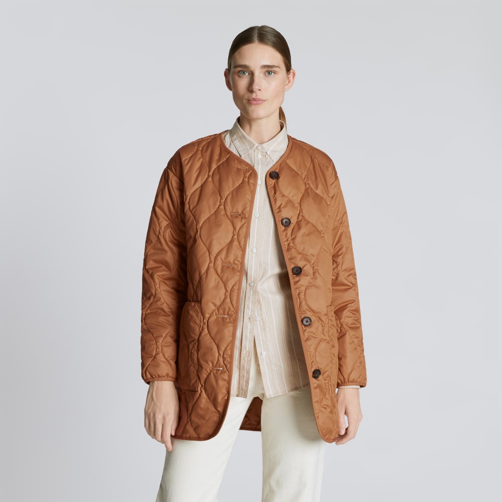 The Quilted Liner in Tawny Brown — front view