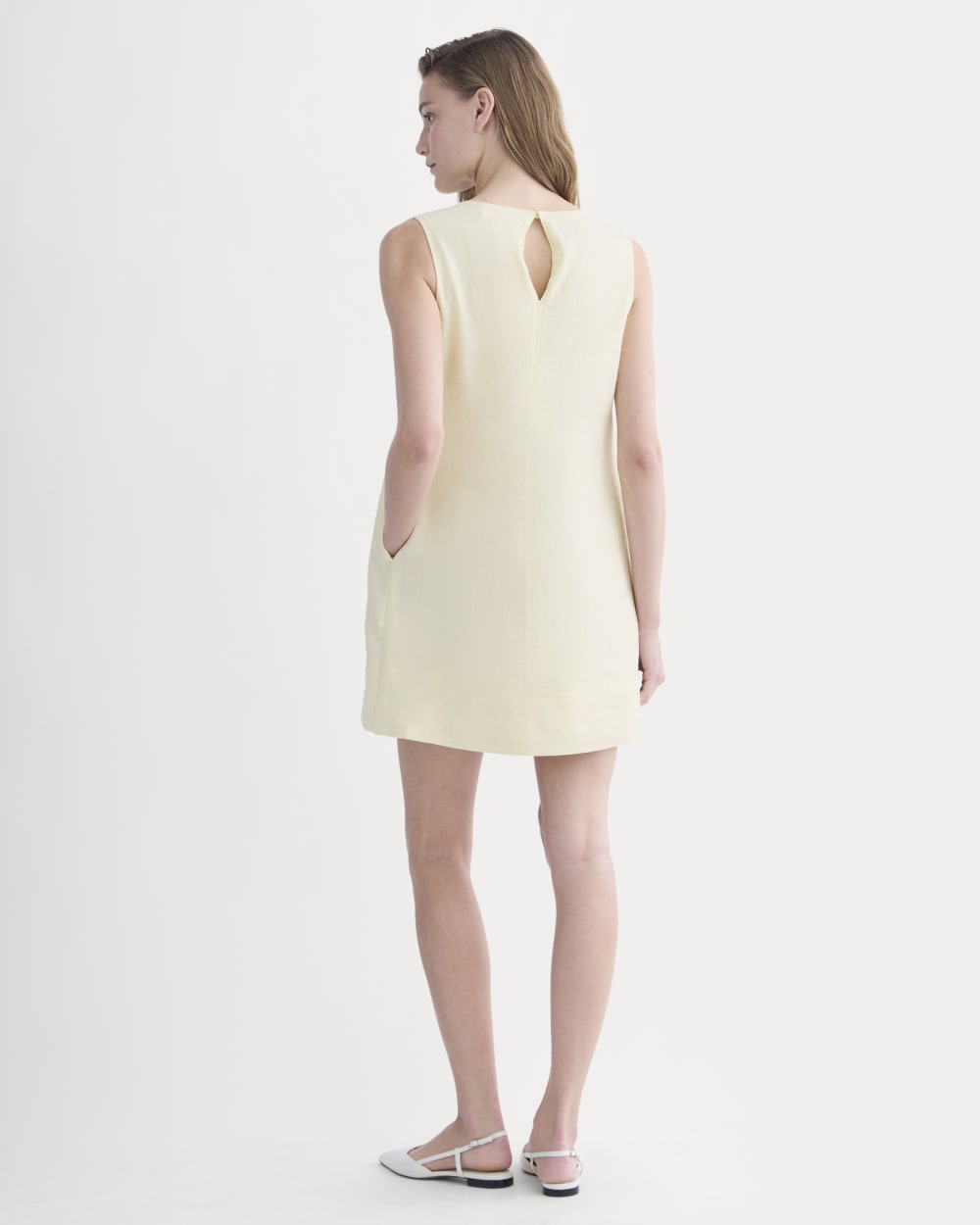 The Shift Dress in Stretch Linen in Light Yellow — detail view