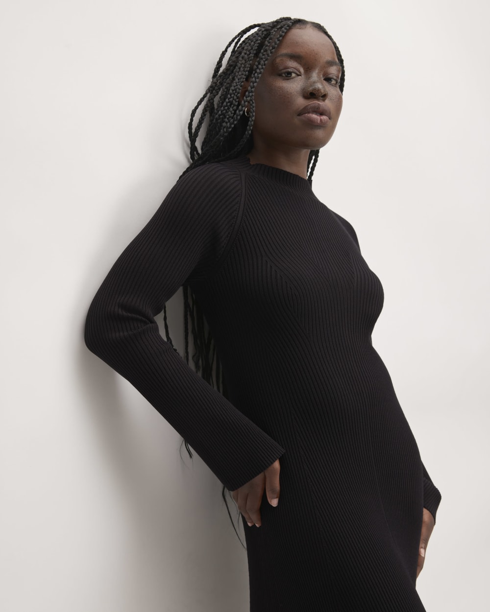 The Ribbed Mock Neck Midi Dress in Black — detail view