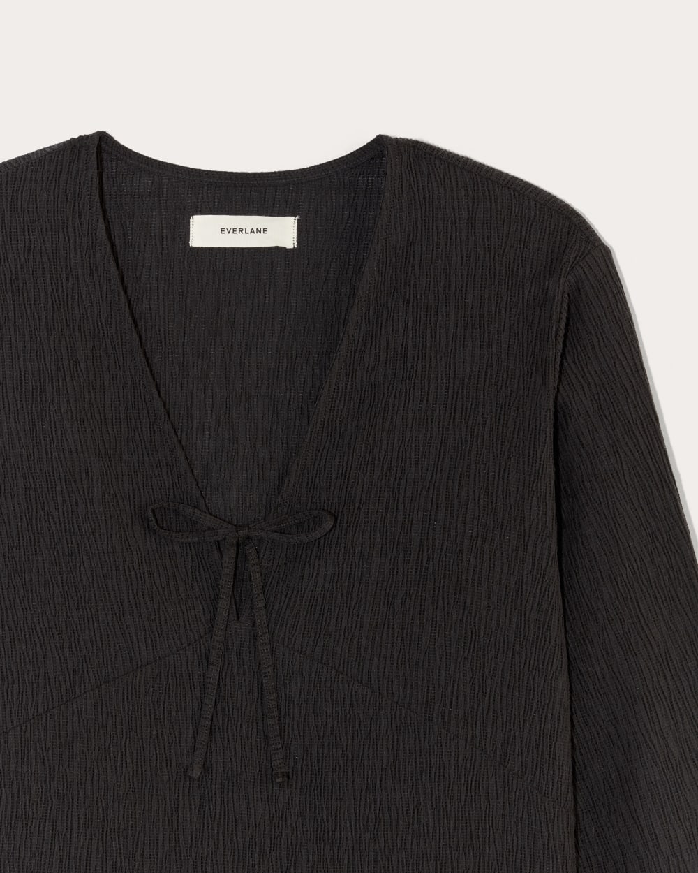 The Crinkle Long-Sleeve in Black — detail view