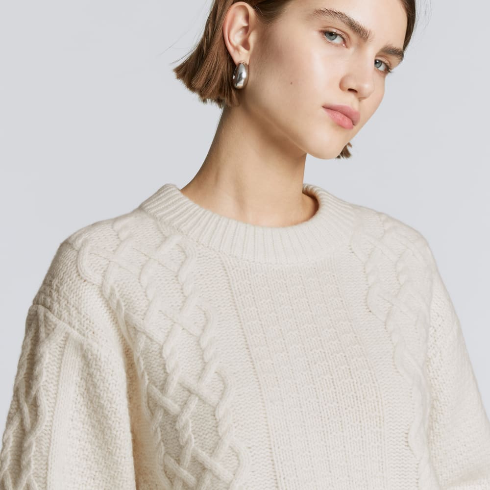 The Felted Merino Cropped Cable Sweater in Bone — detail view