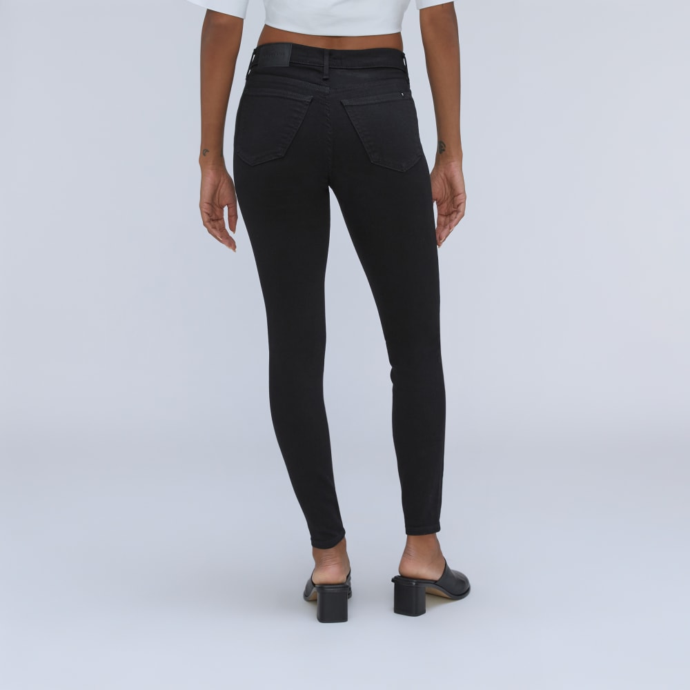 The Mid-Rise Skinny Stretch Jean in Black — detail view