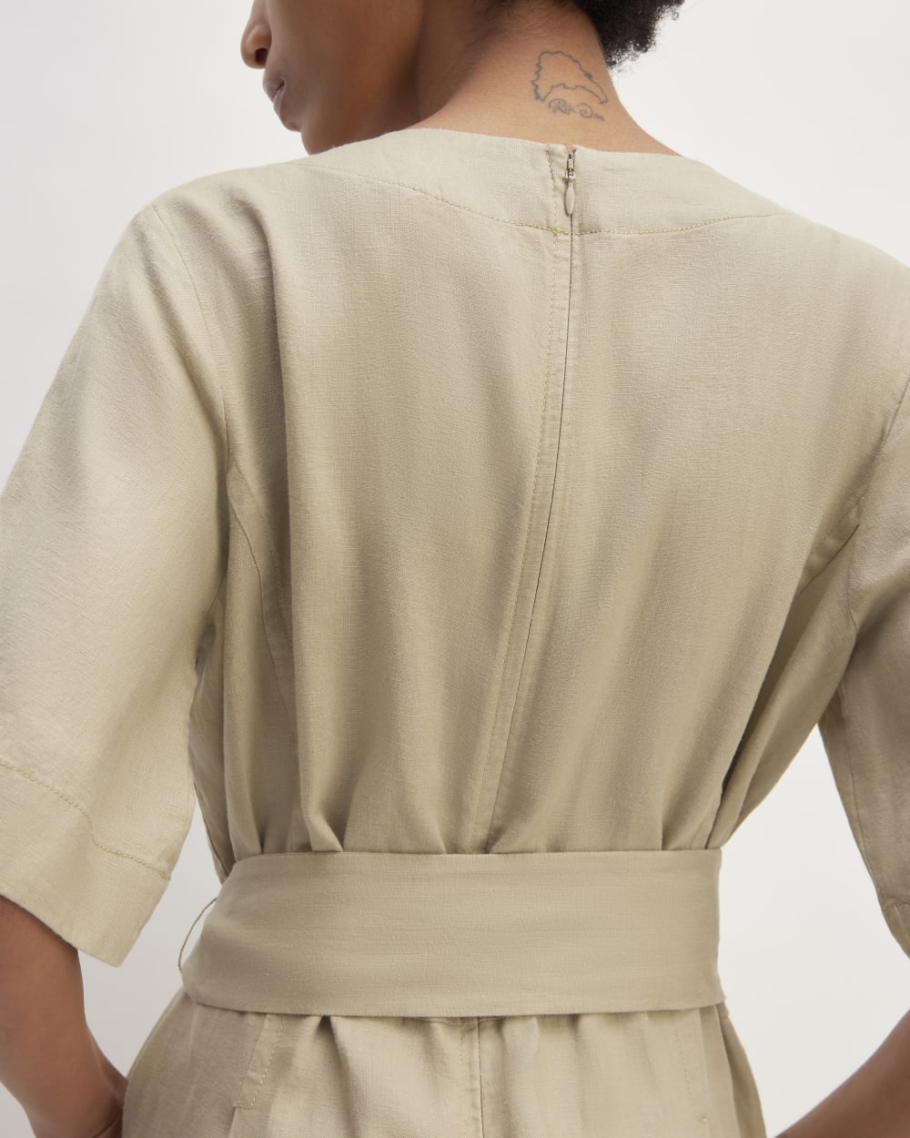 The Wrap Jumpsuit in Linen in Trench Coat Khaki — detail view