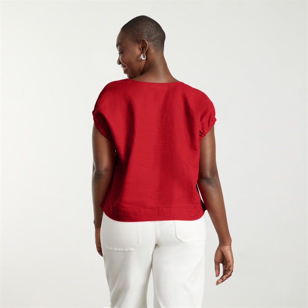 The Drawstring Tunic in Goji Berry — detail view