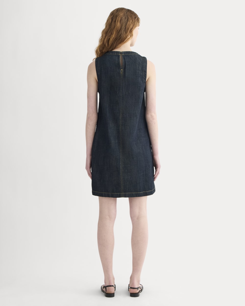 The Denim Shift Dress in Dark Indigo — detail view