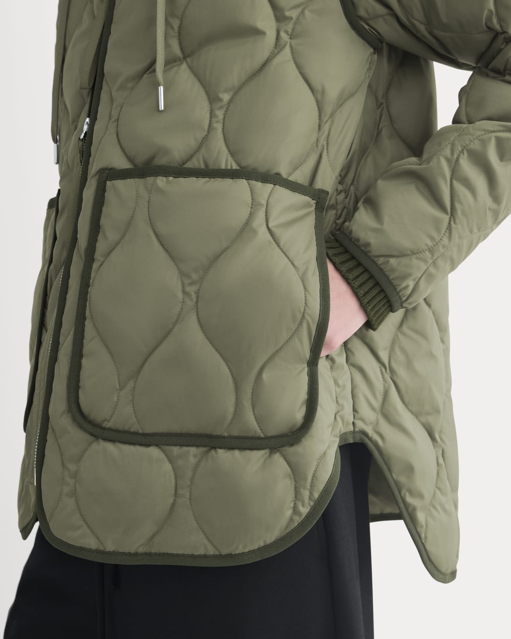 ReNew Quilted Hooded Liner in Lichen Green — detail view