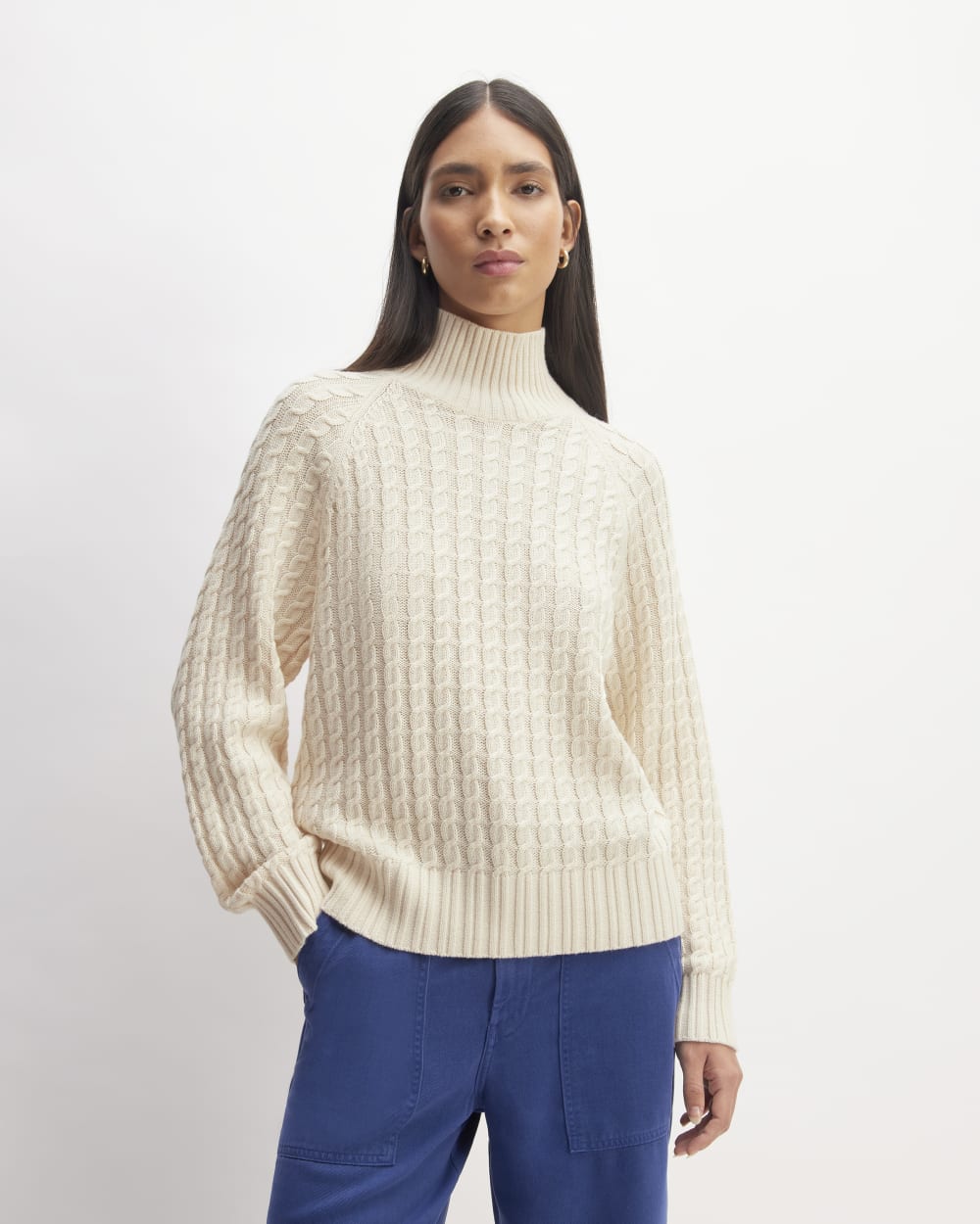 The Cotton Merino Cable Turtleneck in Canvas — front view