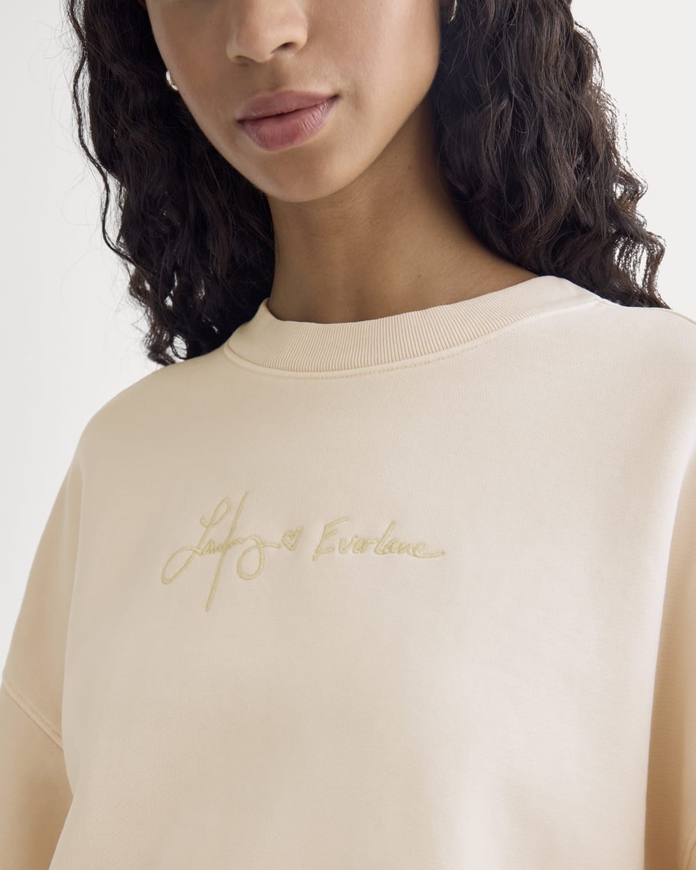 Everlane x The Laufey Foundation Cropped Sweatshirt in Pale Peony — detail view