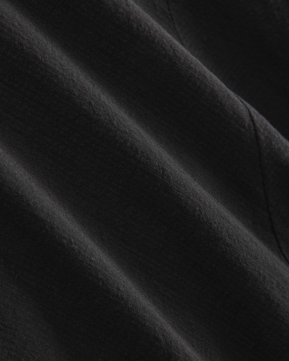 The Flowy Gauze Cami in Black — detail view