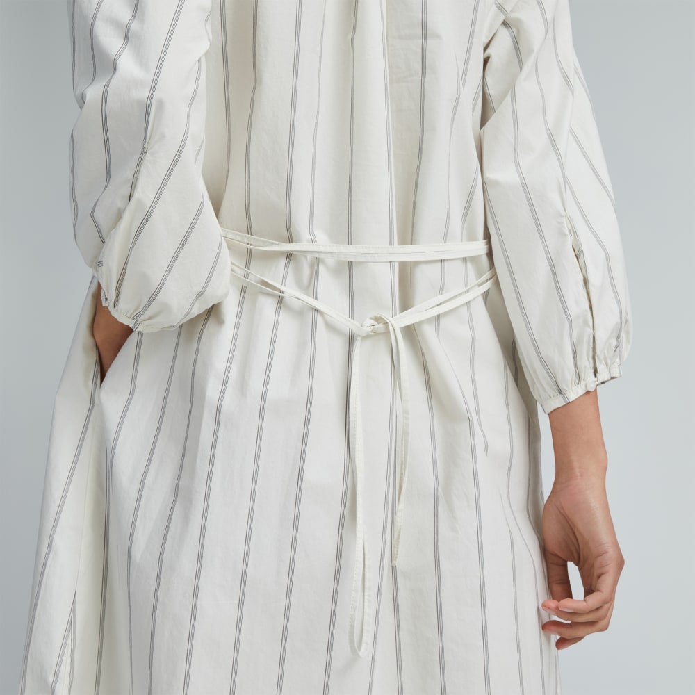 The Raglan Sleeve Poplin Dress in Black / Canvas Tan — detail view