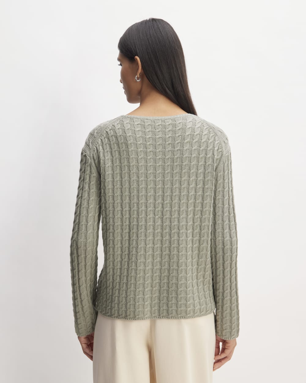 The Cotton Merino Cable Crew in Sage Green — detail view