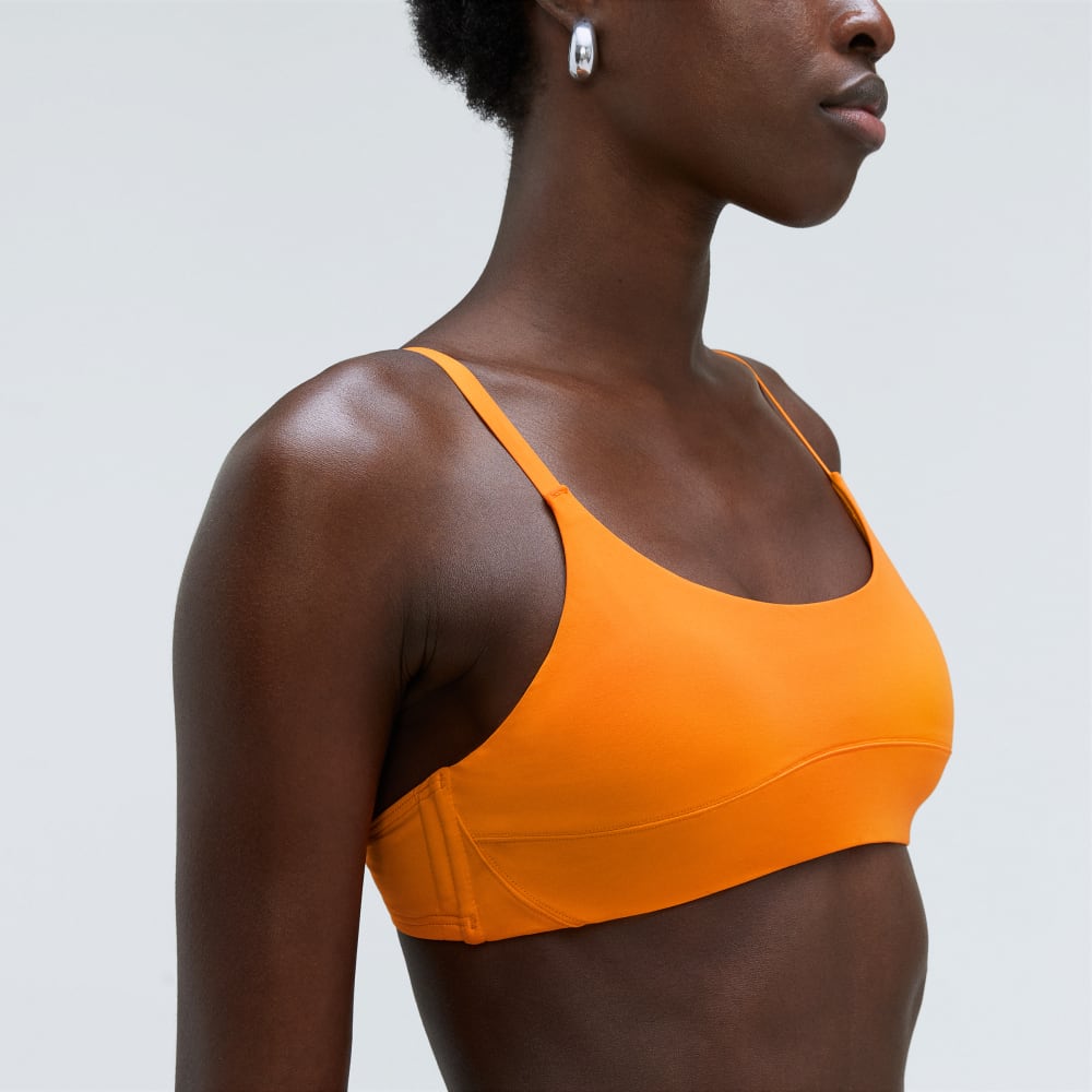 The Scoop-Neck Bikini Top in Turmeric — detail view