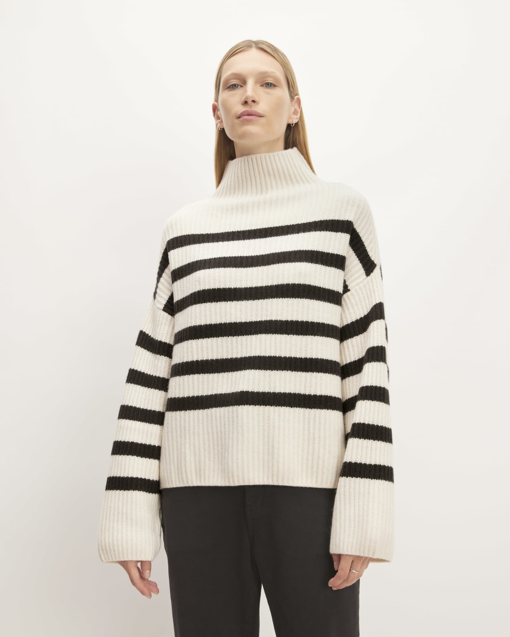 The Felted Merino Funnel-Neck Pullover in Black / Bone — front view