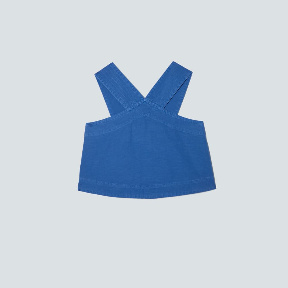 The Cross-Front Apron Top in Deep Blue — front view