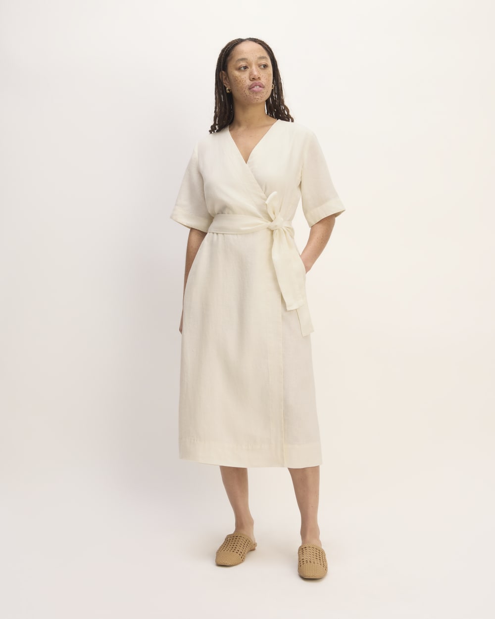 The Wrap Dress in Linen in Bone — front view