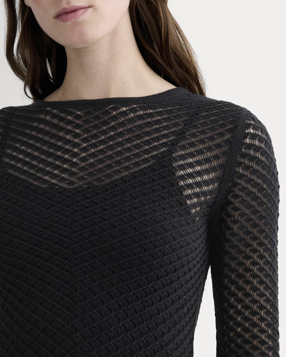 The Lace Knit Mini Dress in Black — detail view