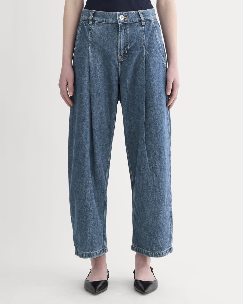 The High Rise Pleated Jean in Mid Indigo — detail view