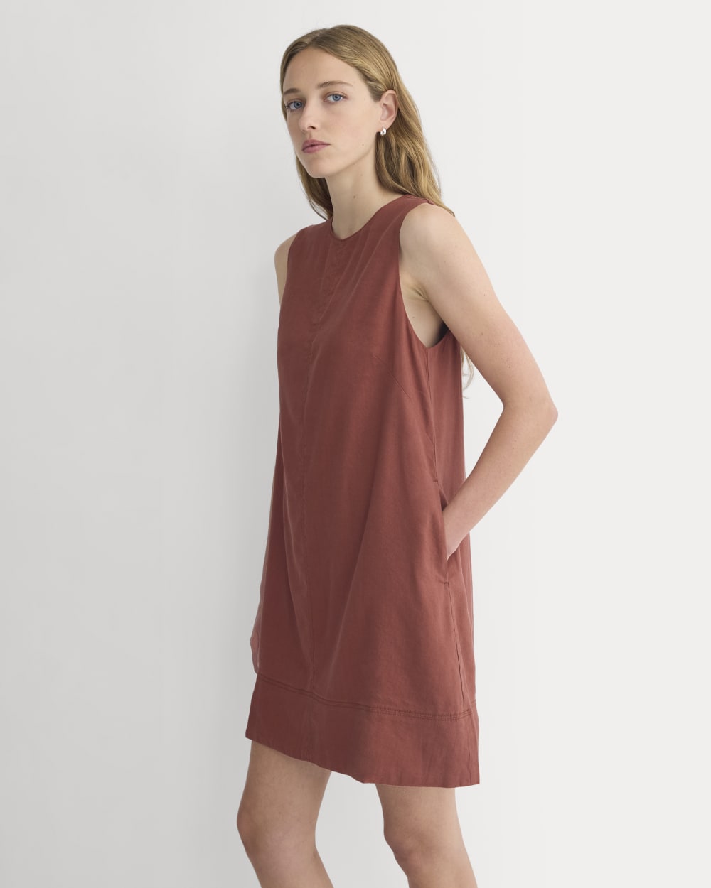 The Shift Dress in Stretch Linen in Henna Red — detail view