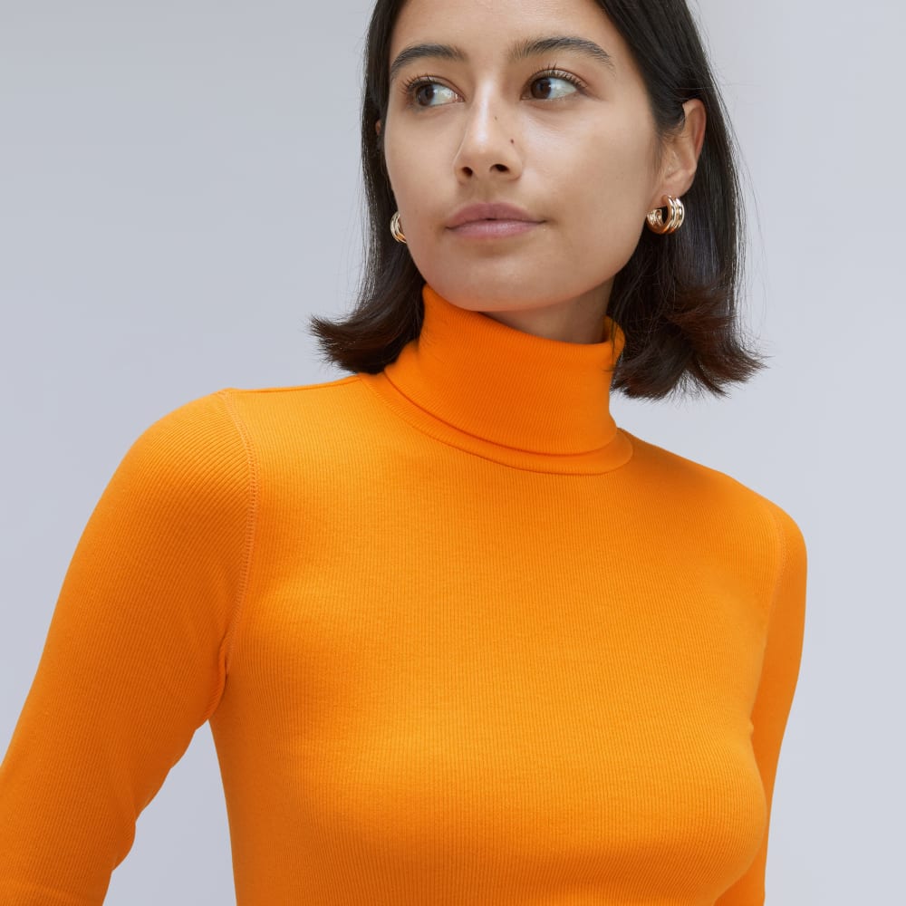 The Luxe Micro-Rib Turtleneck in Turmeric — detail view