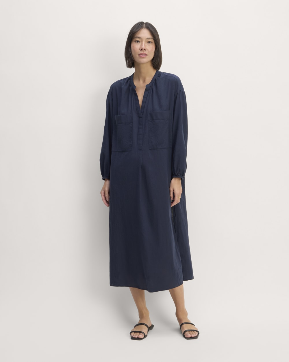 The Gauze Caftan Dress in Navy — detail view