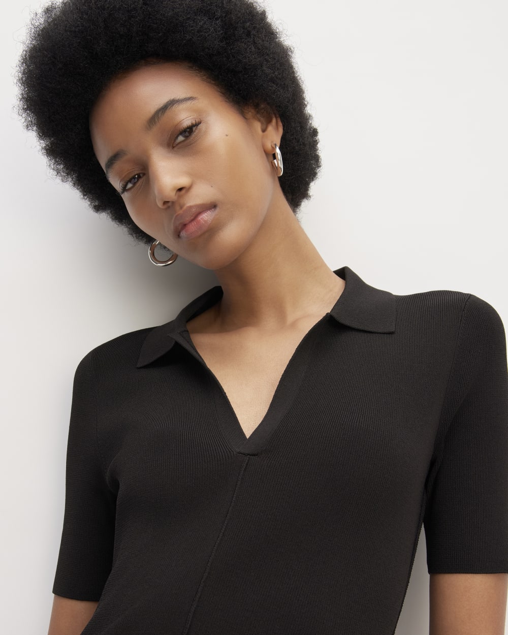 The Viscose Knit Polo Midi Dress in Black — detail view