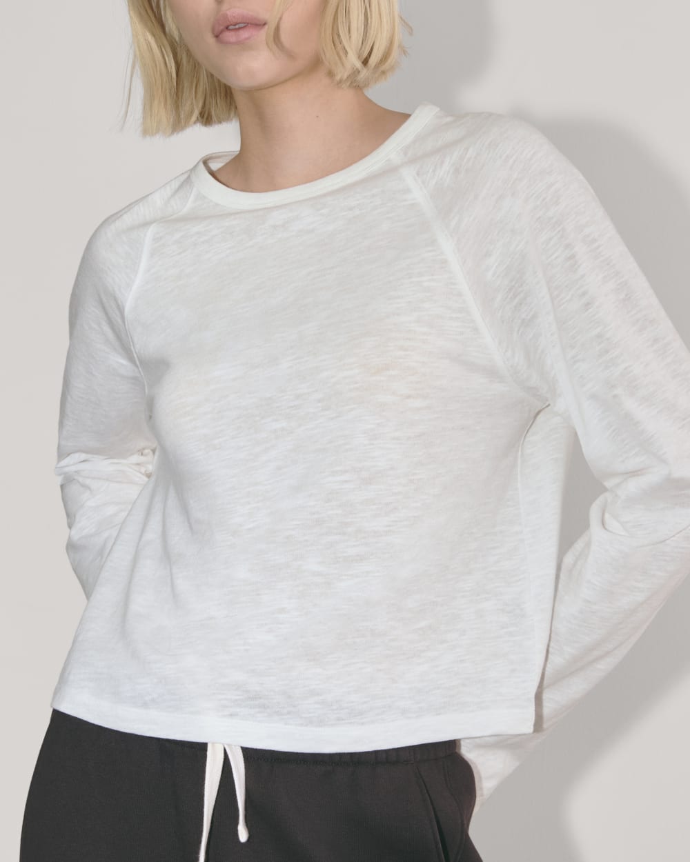The Perform Crew Tee in White — detail view