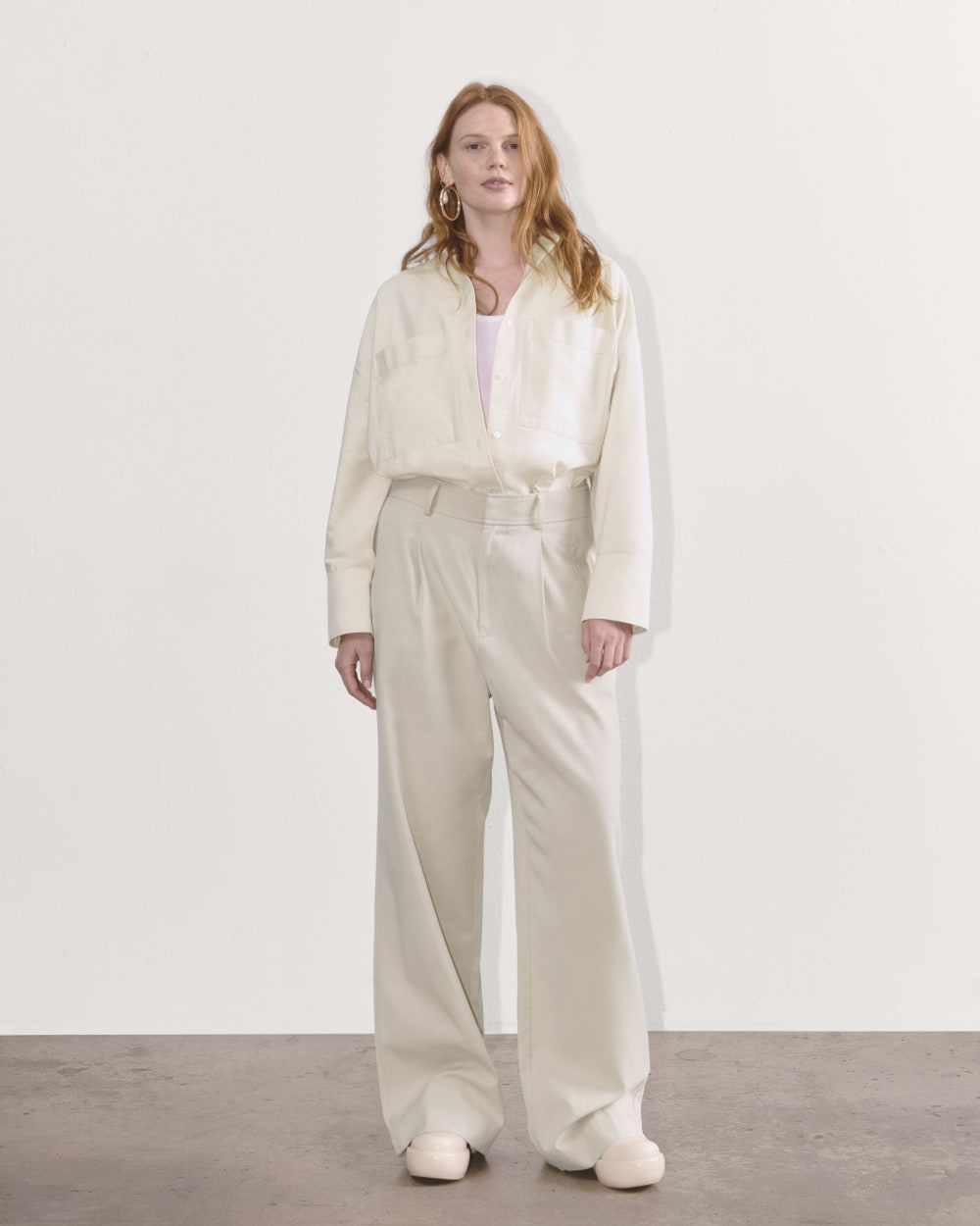 The Draper Pleated Pant in Buttersmooth in Sandstone — detail view