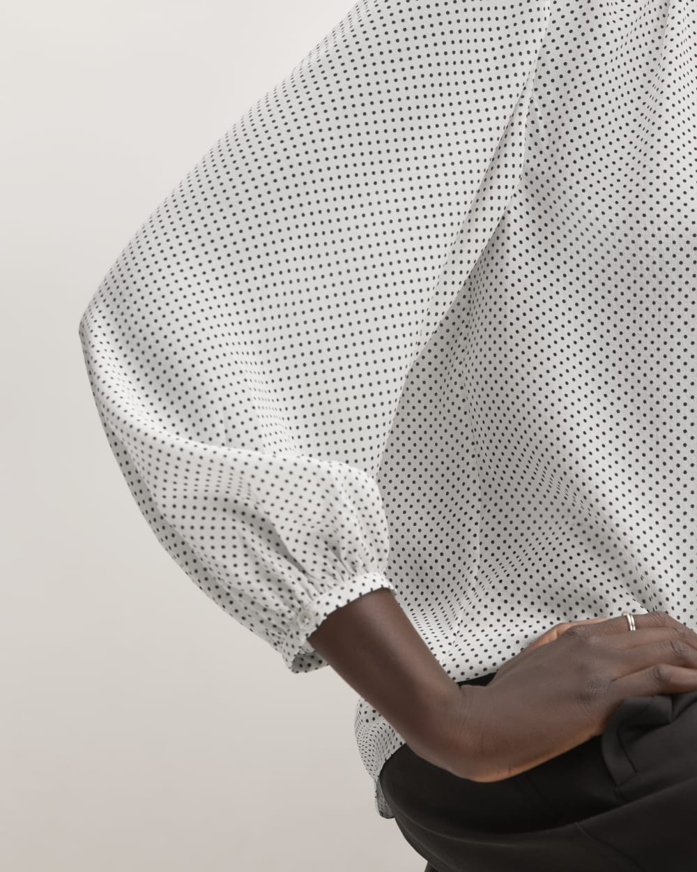 The Washable Clean Silk Shirred Blouse in Bone / Black Polka Dot — detail view